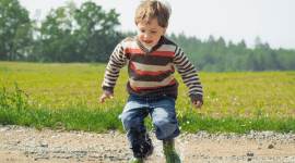 a child running in a park