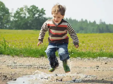 a child running in a park