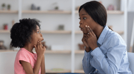 A speech language pathologist working with a young child